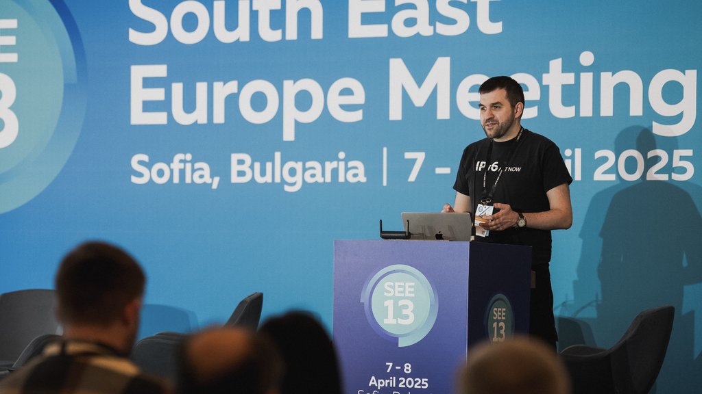 a photo of Ondřej Caletka giving a presentation