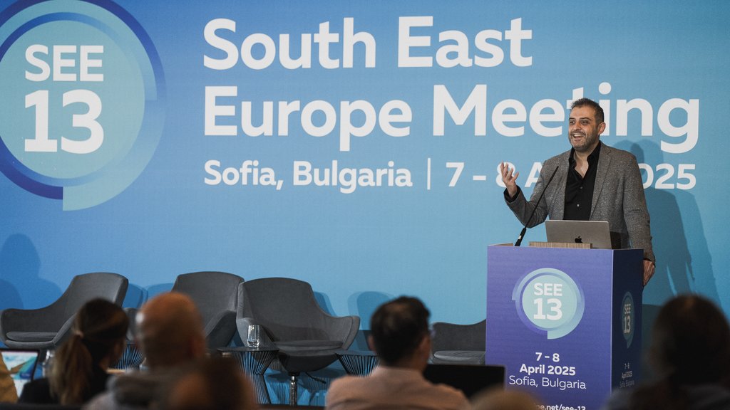 a photo of Hisham Ibrahim giving a presentation