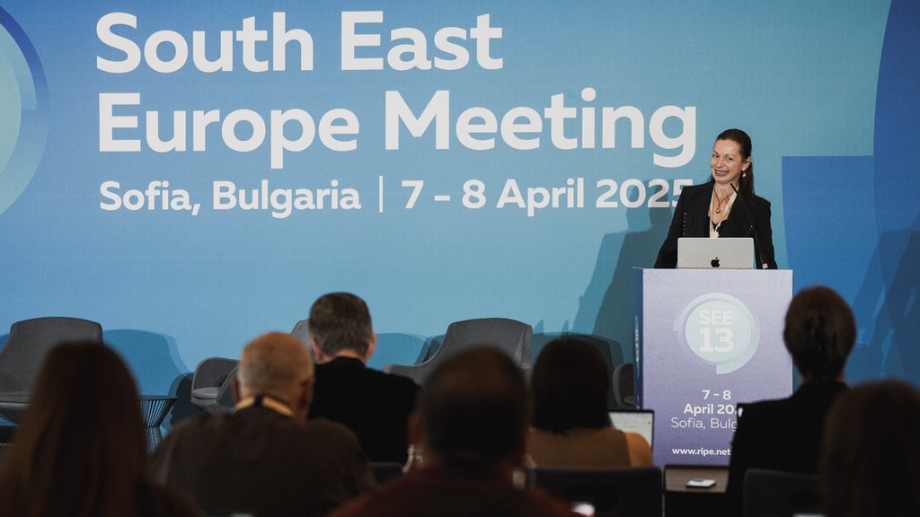 a photo of Mila Zhivkova giving a presentation