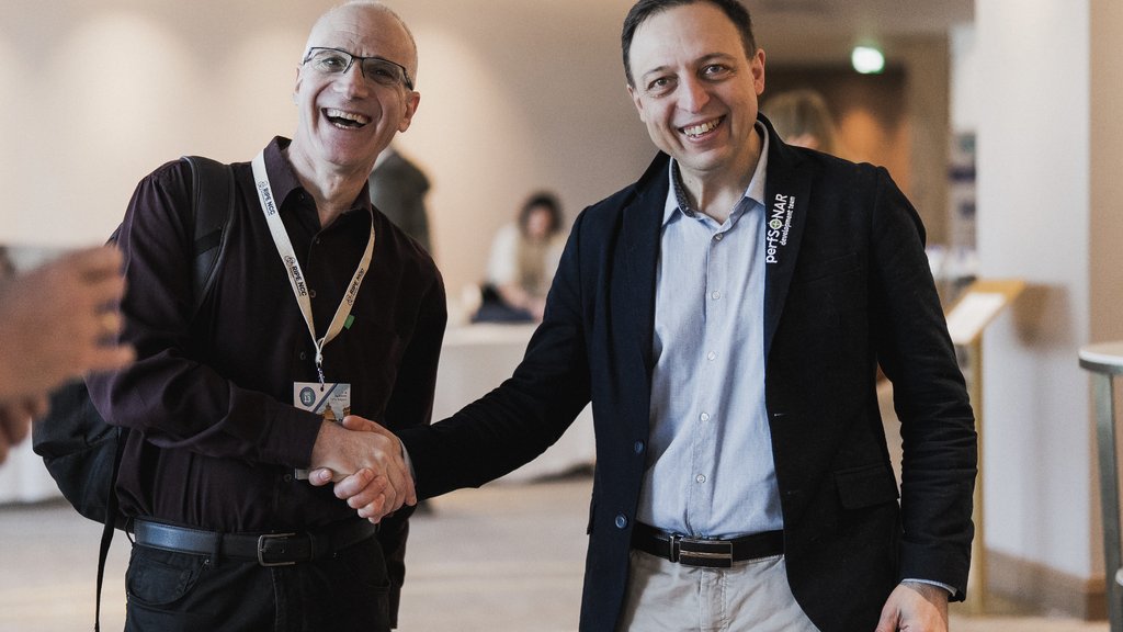 a photo of two men shaking hands