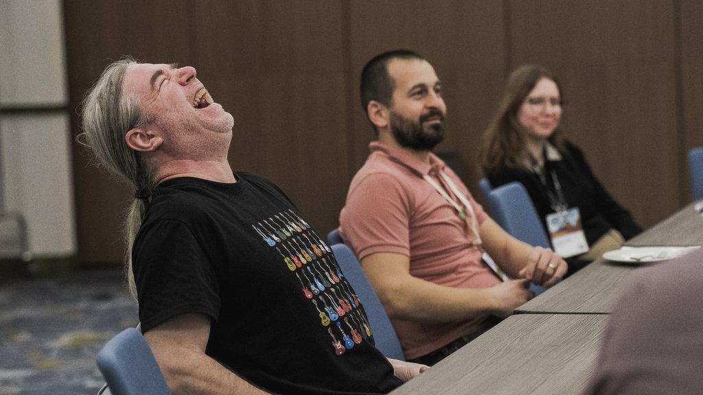 a candid photo of a man laughing